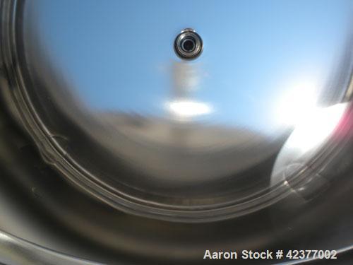 Used DCI Pressure Tank, 184 Gallon, 316L stainless steel, vertical. 41-3/4" Diameter x 26" straight side, dish top and bottom. Internal rated +35/-15 psi @ 284 degrees F. Internal CIP spray ball. Ope...