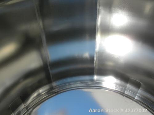 Used DCI Pressure Tank, 184 Gallon, 316L stainless steel, vertical. 41-3/4" Diameter x 26" straight side, dish top and bottom. Internal rated +35/-15 psi @ 284 degrees F. Internal CIP spray ball. Ope...