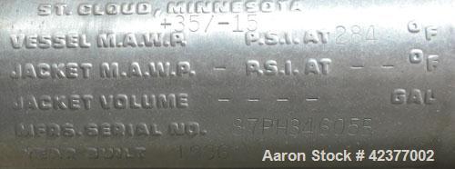 Used DCI Pressure Tank, 184 Gallon, 316L stainless steel, vertical. 41-3/4" Diameter x 26" straight side, dish top and bottom. Internal rated +35/-15 psi @ 284 degrees F. Internal CIP spray ball. Ope...