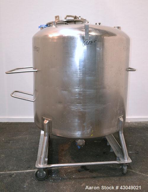 Used DCI Pressure Tank, 211.34 Gallon, 316 Stainless Steel, Vertical. 43-1/4’’ Diameter x 37’’ straight side, dished top and bottom. Internal rated 50 psi at 300 degrees F. Openings: top 16’’ manway ...