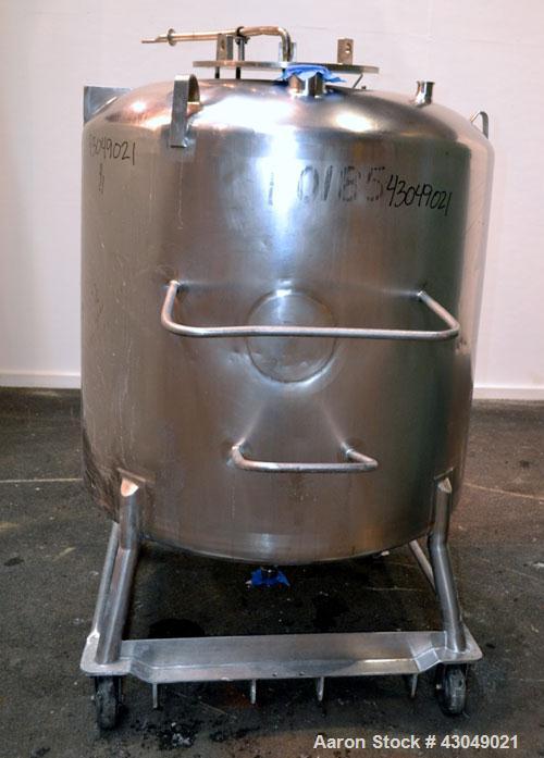 Used DCI Pressure Tank, 211.34 Gallon, 316 Stainless Steel, Vertical. 43-1/4’’ Diameter x 37’’ straight side, dished top and bottom. Internal rated 50 psi at 300 degrees F. Openings: top 16’’ manway ...