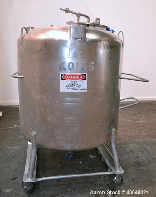Used DCI Pressure Tank, 211.34 Gallon, 316 Stainless Steel, Vertical. 43-1/4’’ Diameter x 37’’ straight side, dished top and bottom. Internal rated 50 psi at 300 degrees F. Openings: top 16’’ manway ...
