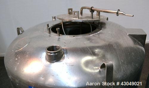 Used DCI Pressure Tank, 211.34 Gallon, 316 Stainless Steel, Vertical. 43-1/4’’ Diameter x 37’’ straight side, dished top and bottom. Internal rated 50 psi at 300 degrees F. Openings: top 16’’ manway ...