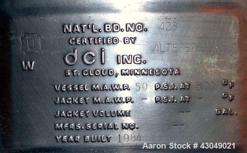 Used DCI Pressure Tank, 211.34 Gallon, 316 Stainless Steel, Vertical. 43-1/4’’ Diameter x 37’’ straight side, dished top and bottom. Internal rated 50 psi at 300 degrees F. Openings: top 16’’ manway ...