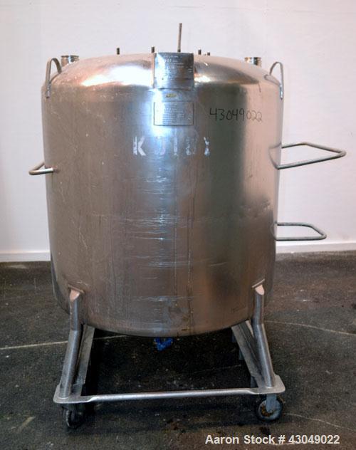 Used DCI Pressure Tank, 211.34 Gallon, 316 Stainless Steel, Vertical. 43-1/4’’ Diameter x 37’’ straight side, dished top and bottom. Internal rated 50 psi at 300 degrees F. Openings: top 16’’ manway,...