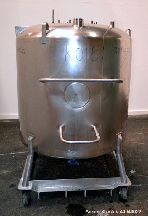Used DCI Pressure Tank, 211.34 Gallon, 316 Stainless Steel, Vertical. 43-1/4’’ Diameter x 37’’ straight side, dished top and bottom. Internal rated 50 psi at 300 degrees F. Openings: top 16’’ manway,...