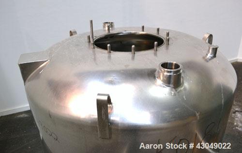 Used DCI Pressure Tank, 211.34 Gallon, 316 Stainless Steel, Vertical. 43-1/4’’ Diameter x 37’’ straight side, dished top and bottom. Internal rated 50 psi at 300 degrees F. Openings: top 16’’ manway,...