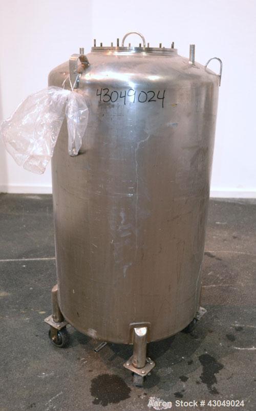 Used DCI Pressure Tank, 150 Gallon, 316L Stainless Steel, Vertical. 30’’ Diameter x 44’’ straight side, dished top and bottom. Internal rated 25 psi at 200 degrees F. Openings: top 12’’ manway with c...