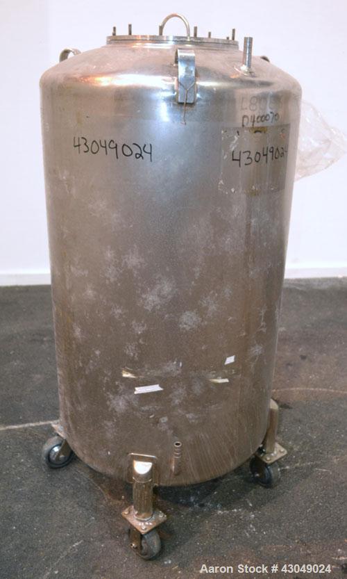 Used DCI Pressure Tank, 150 Gallon, 316L Stainless Steel, Vertical. 30’’ Diameter x 44’’ straight side, dished top and bottom. Internal rated 25 psi at 200 degrees F. Openings: top 12’’ manway with c...