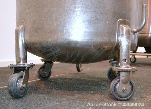 Used DCI Pressure Tank, 150 Gallon, 316L Stainless Steel, Vertical. 30’’ Diameter x 44’’ straight side, dished top and bottom. Internal rated 25 psi at 200 degrees F. Openings: top 12’’ manway with c...
