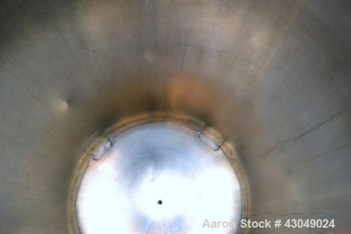 Used DCI Pressure Tank, 150 Gallon, 316L Stainless Steel, Vertical. 30’’ Diameter x 44’’ straight side, dished top and bottom. Internal rated 25 psi at 200 degrees F. Openings: top 12’’ manway with c...