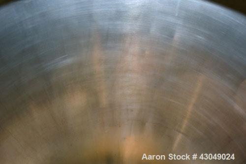 Used DCI Pressure Tank, 150 Gallon, 316L Stainless Steel, Vertical. 30’’ Diameter x 44’’ straight side, dished top and bottom. Internal rated 25 psi at 200 degrees F. Openings: top 12’’ manway with c...
