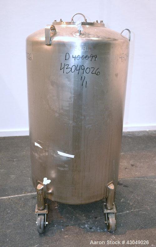 Used DCI Pressure Tank, 150 Gallon, 316L Stainless Steel, Vertical. 30’’ Diameter x 44’’ straight side, dished top and bottom. Internal rated 25 psi at 200 degrees F. Openings: top 12’’ manway with c...