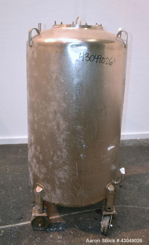Used DCI Pressure Tank, 150 Gallon, 316L Stainless Steel, Vertical. 30’’ Diameter x 44’’ straight side, dished top and bottom. Internal rated 25 psi at 200 degrees F. Openings: top 12’’ manway with c...