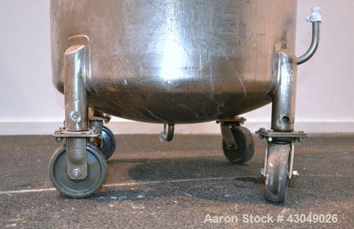 Used DCI Pressure Tank, 150 Gallon, 316L Stainless Steel, Vertical. 30’’ Diameter x 44’’ straight side, dished top and bottom. Internal rated 25 psi at 200 degrees F. Openings: top 12’’ manway with c...