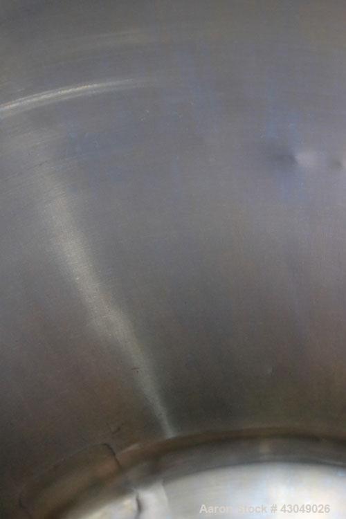 Used DCI Pressure Tank, 150 Gallon, 316L Stainless Steel, Vertical. 30’’ Diameter x 44’’ straight side, dished top and bottom. Internal rated 25 psi at 200 degrees F. Openings: top 12’’ manway with c...