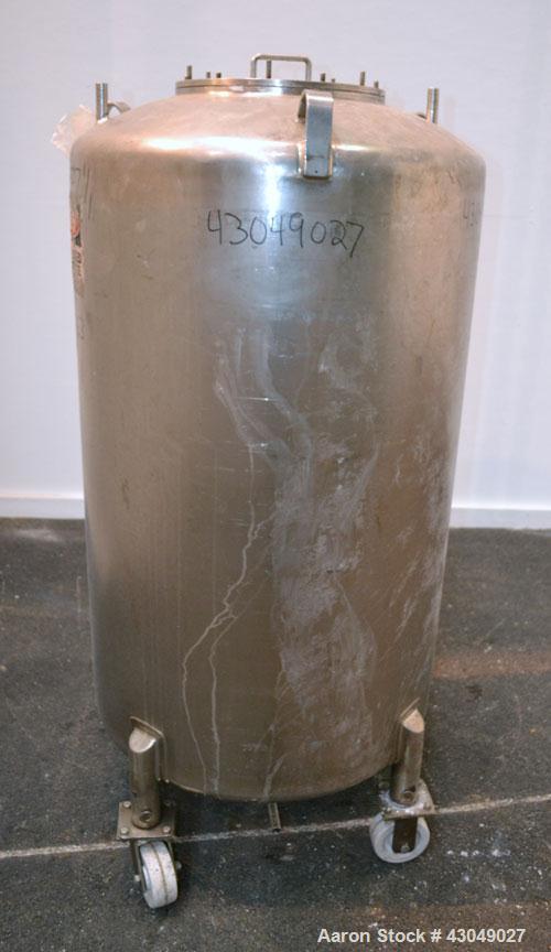 Used DCI Pressure Tank, 150 Gallon, 316L Stainless Steel, Vertical. 30’’ Diameter x 44’’ straight side, dished top and bottom. Internal rated 25 psi at 200 degrees F. Openings: top 12’’ manway with c...