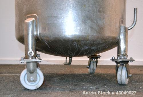 Used DCI Pressure Tank, 150 Gallon, 316L Stainless Steel, Vertical. 30’’ Diameter x 44’’ straight side, dished top and bottom. Internal rated 25 psi at 200 degrees F. Openings: top 12’’ manway with c...