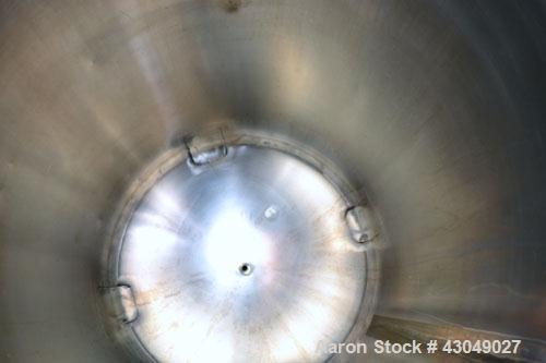 Used DCI Pressure Tank, 150 Gallon, 316L Stainless Steel, Vertical. 30’’ Diameter x 44’’ straight side, dished top and bottom. Internal rated 25 psi at 200 degrees F. Openings: top 12’’ manway with c...