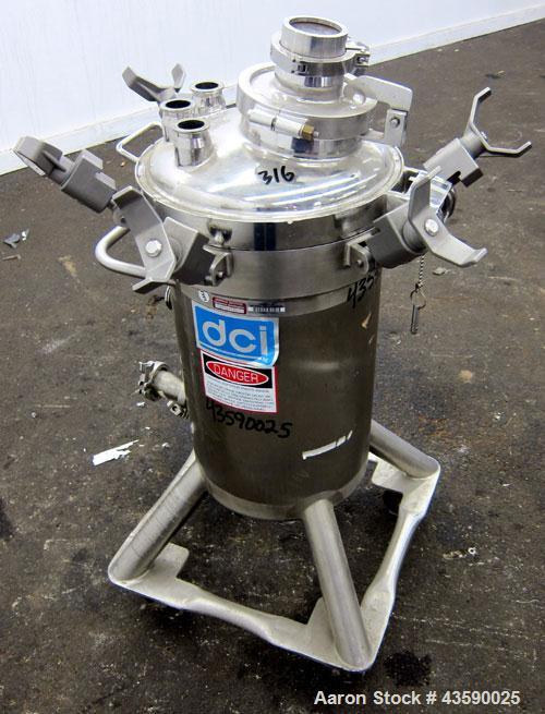 Used DCI Pressure Tank, 50 Liter (13.21 Gallon), 316L Stainless Steel, Vertical. Approximate 13” diameter x 21” straight side. Dished clamp on top, dished bottom. Internal rated 100/-15 psi at -20 to...