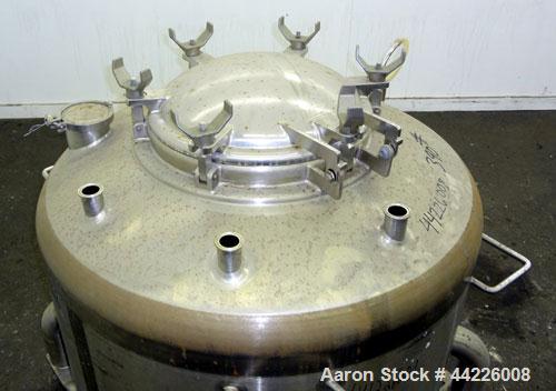 Used DCI Pressure Tank, 158.5 Gallon (600 Liter), 316 Stainless Steel, Vertical. 41-3/4" Diameter x 21" straight side, dished top and bottom. Internal rated 25 psi & Full Vacuum at 256 degrees F. Ope...