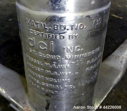 Used DCI Pressure Tank, 158.5 Gallon (600 Liter), 316 Stainless Steel, Vertical. 41-3/4" Diameter x 21" straight side, dished top and bottom. Internal rated 25 psi & Full Vacuum at 256 degrees F. Ope...