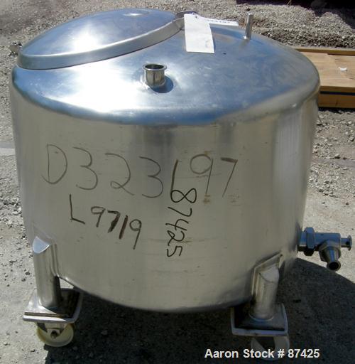 USED: DCI tank, 100 gallon, 316 stainless steel, vertical. 38" diameter x 20" straight side, dish top, inverted dished sloped bottom. Openings: top 2" tri clamp, 18" manway with cover; 2" side bottom...