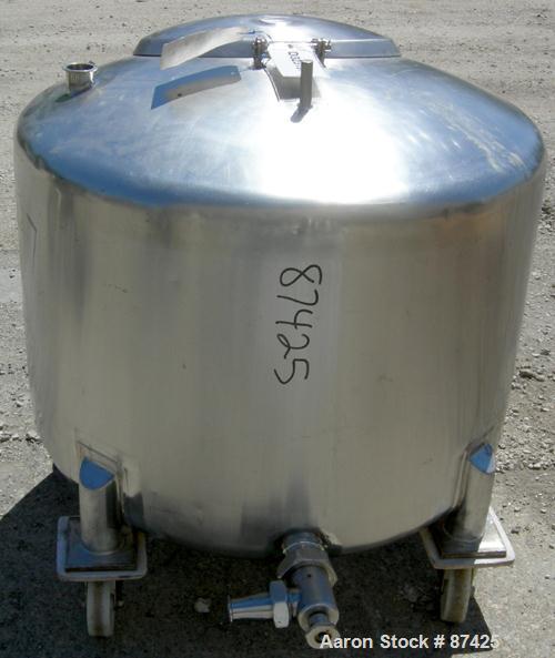 USED: DCI tank, 100 gallon, 316 stainless steel, vertical. 38" diameter x 20" straight side, dish top, inverted dished sloped bottom. Openings: top 2" tri clamp, 18" manway with cover; 2" side bottom...
