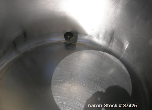 USED: DCI tank, 100 gallon, 316 stainless steel, vertical. 38" diameter x 20" straight side, dish top, inverted dished sloped bottom. Openings: top 2" tri clamp, 18" manway with cover; 2" side bottom...
