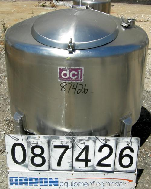 USED: DCI tank, 100 gallon, 316 stainless steel, vertical. 38" diameter x 20" straight side, dish top, inverted dished sloped bottom. Openings: top 2" tri clamp, 18" manway with cover; 2" side bottom...
