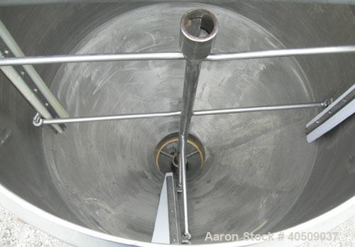 Used Dairy Craft tank, 175 gallon, 304 stainless steel, vertical. 42" diameter x 28" straight side x 28" coned bottom, flat top with (2) 1/3 covers. Hinged stainless steel agitator bridge. Bottom sup...