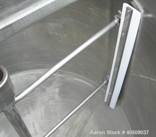 Used Dairy Craft tank, 175 gallon, 304 stainless steel, vertical. 42" diameter x 28" straight side x 28" coned bottom, flat top with (2) 1/3 covers. Hinged stainless steel agitator bridge. Bottom sup...