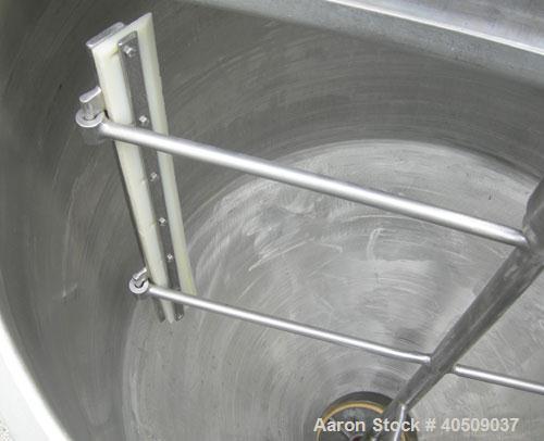 Used Dairy Craft tank, 175 gallon, 304 stainless steel, vertical. 42" diameter x 28" straight side x 28" coned bottom, flat top with (2) 1/3 covers. Hinged stainless steel agitator bridge. Bottom sup...
