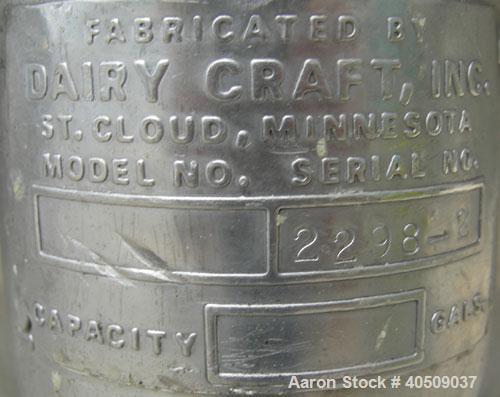 Used Dairy Craft tank, 175 gallon, 304 stainless steel, vertical. 42" diameter x 28" straight side x 28" coned bottom, flat top with (2) 1/3 covers. Hinged stainless steel agitator bridge. Bottom sup...