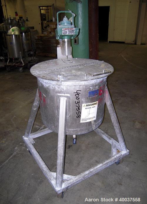 Used Douglas Brothers Tank, 40 gallon, stainless steel, vertical. 24" diameter x 18" straight side. Open top with a 1/2 hinged cover, dished bottom. Clamp on Lightnin air operated agitator, model NAR...