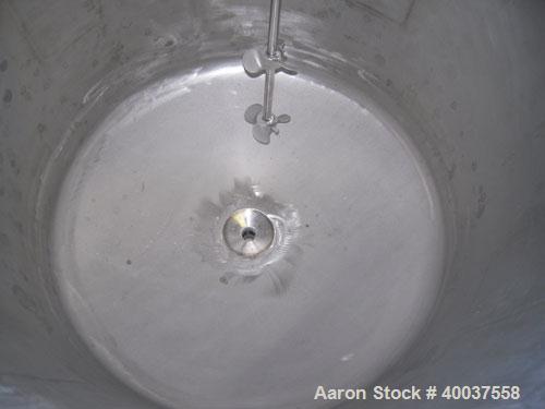 Used Douglas Brothers Tank, 40 gallon, stainless steel, vertical. 24" diameter x 18" straight side. Open top with a 1/2 hinged cover, dished bottom. Clamp on Lightnin air operated agitator, model NAR...