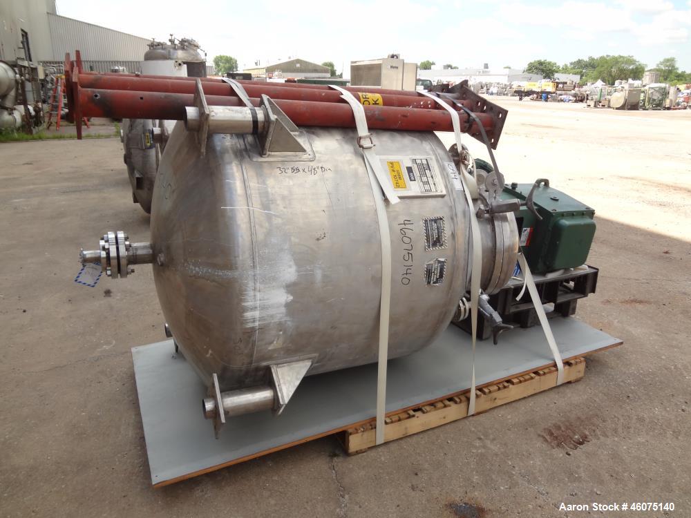 Used Eastern Manufacturing Pressure Tank, 275 Gallon, 316L Stainless Steel, Vertical. Approximate 48" diameter x 32" straight side, dished top & bottom. Internal rated 80 psi/Full Vacuum at -20 to 20...