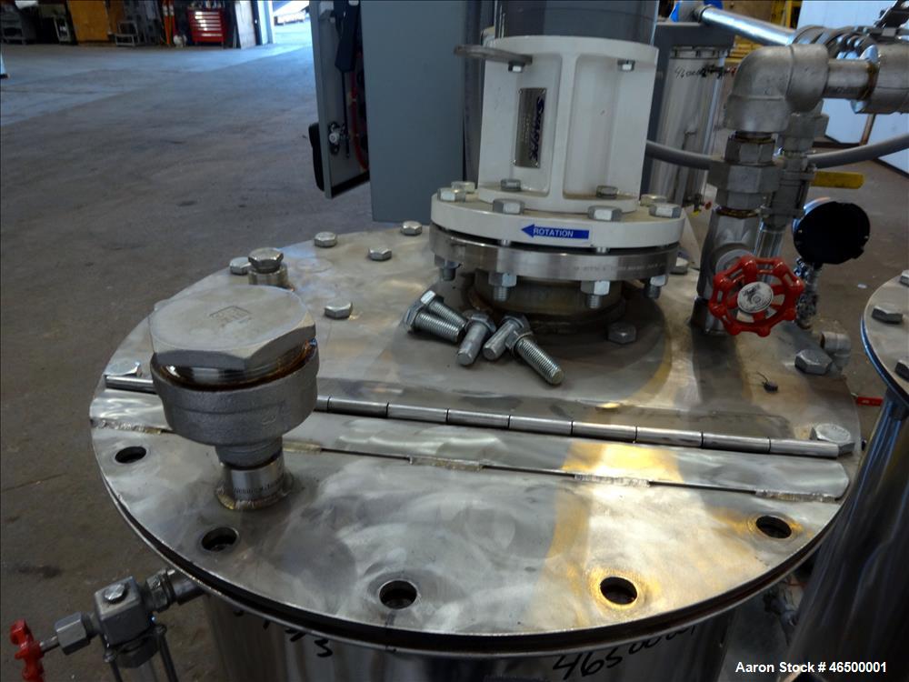 Used EnviroSep Packaged Mixing & Pumping System, Model 2S-MW-CF1. Consists of: (2) Tanks, each approximate 70 gallon, 304 stainless steel, vertical. 24" Diameter x 36" straight side, flat top with a ...