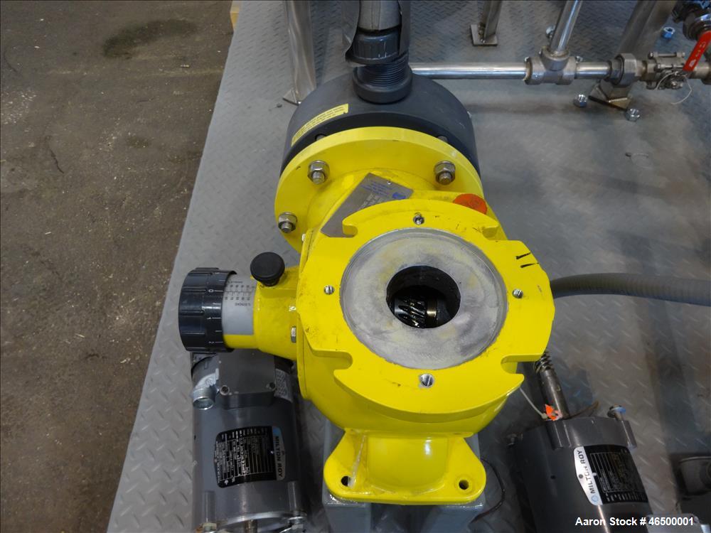 Used EnviroSep Packaged Mixing & Pumping System, Model 2S-MW-CF1. Consists of: (2) Tanks, each approximate 70 gallon, 304 stainless steel, vertical. 24" Diameter x 36" straight side, flat top with a ...