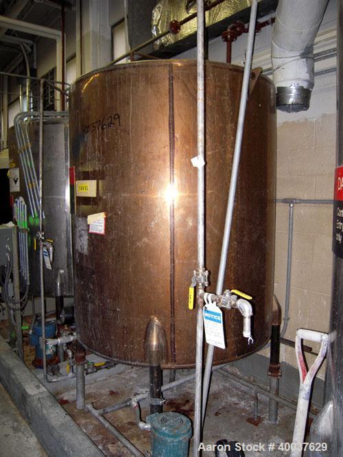 Used Ertel Tank, 580 Gallon, Stainless steel, Vertical. 53" diameter x 60" straight side, flat top, slight dished bottom. Openings top 17" manway, 2" NPT center bottom outlet. Mounted on 4 carbon ste...