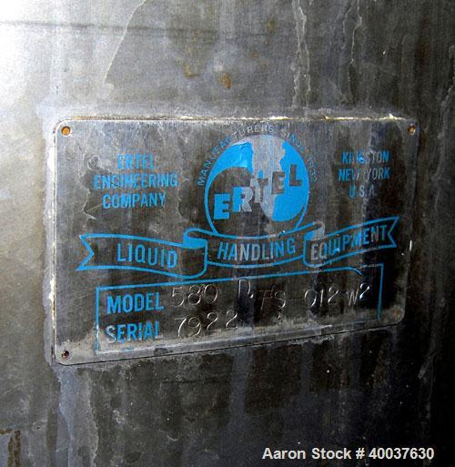 Used Ertel Tank, 580 Gallon, Stainless steel, Vertical. 53" diameter x 60" straight side, flat top, slight dished bottom. Openings top 17" manway, 2" NPT center bottom outlet. Mounted on 4 carbon ste...