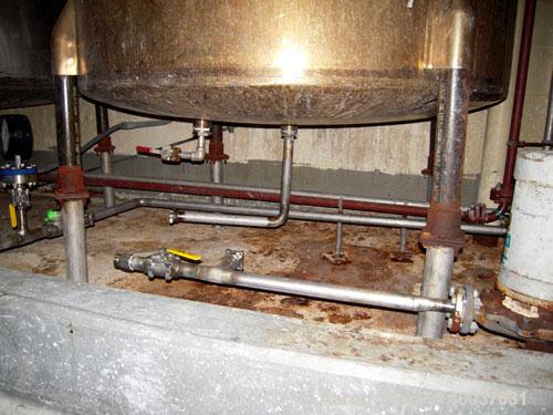 Used Ertel Tank, 580 Gallon, Stainless steel, Vertical. 53" diameter x 60" straight side, flat top, slight dished bottom. Openings top 17" manway, 2" NPT center bottom outlet. Mounted on 4 carbon ste...