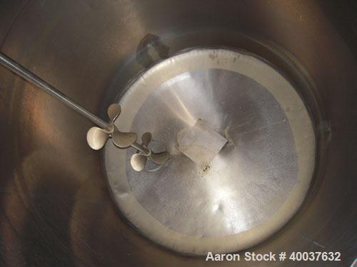Used Ertel Tank, 300 Gallon, Stainless steel, Vertical. 44" diameter x 48" straight side, slight dished top, dished bottom. Off center top entering Lightnin agitator, model NG33G-33, 1" diameter shaf...