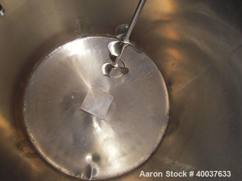 Used Ertel Tank, 300 Gallon, Stainless steel, Vertical. 44" diameter x 48" straight side, slight dished top, dished bottom. Off center top entering Lightnin agitator, model NG33G-33, 1" diameter shaf...
