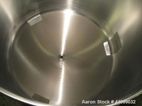 Used Feldmeier tank, 70 gallon, stainless steel construction, 30" diameter X 24" straight side, (1) 2" top NPT nozzle, 1" center bottom outlet, on stainless steel legs, serial # E-715-05