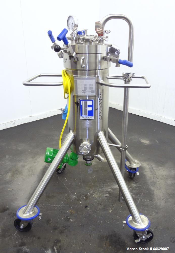 Used Feldmeier Pressure Tank, 13 Gallon (50 Liter), 316L Stainless Steel, Vertical. 12” Diameter x 28” straight side, clamp on slight dished top, dished bottom. Internal rated 50 psi/Full Vacuum at -...