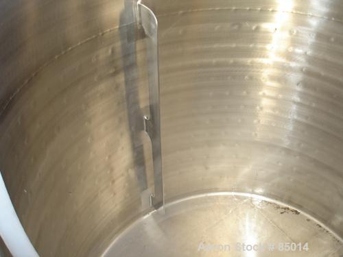 Used Feldmeier Tank, 150 Gallon, Jacketed, 316 Stainless Steel. 35-1/2" diameter x 35-1/2" straight side. Open top with 1" pitched bottom. 1-1/4" side bottom outlet. Has side wall baffles. Jacket rat...