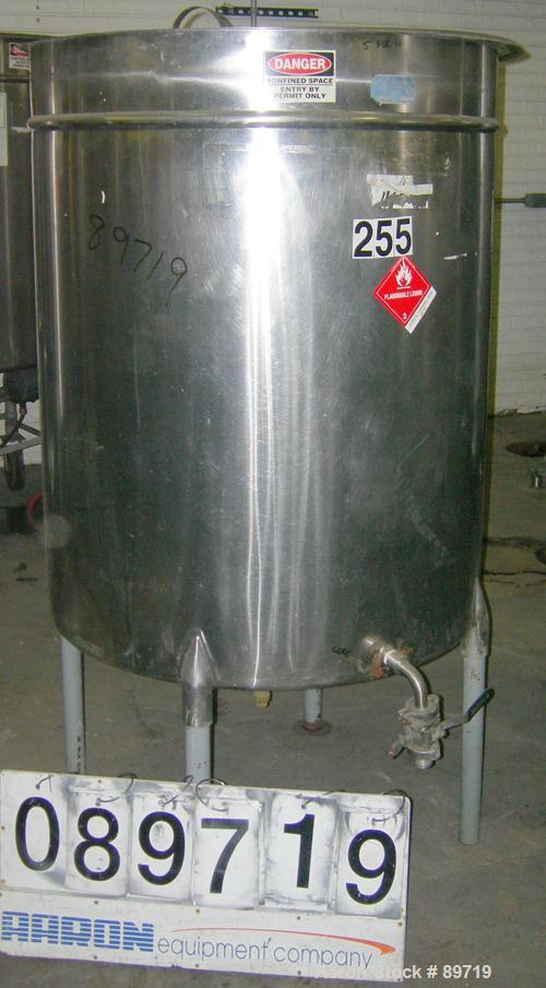 USED: Filpaco tank, 225 gallon, 304 stainless steel, vertical. 38" diameter x 48" straight side, open top with cover, slight coned bottom. Approximate 1" center bottom outlet. Mounted on 4 carbon ste...
