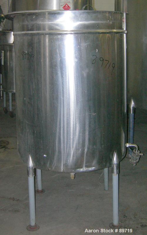 USED: Filpaco tank, 225 gallon, 304 stainless steel, vertical. 38" diameter x 48" straight side, open top with cover, slight coned bottom. Approximate 1" center bottom outlet. Mounted on 4 carbon ste...