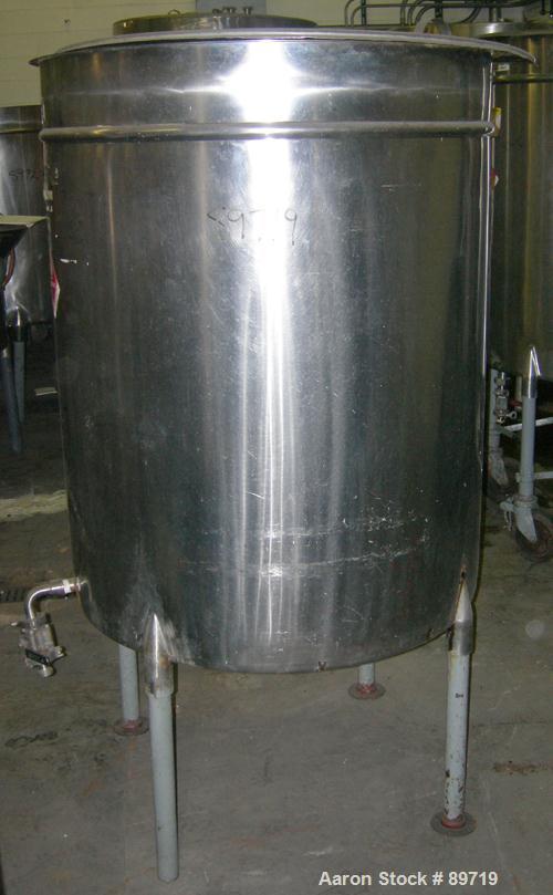 USED: Filpaco tank, 225 gallon, 304 stainless steel, vertical. 38" diameter x 48" straight side, open top with cover, slight coned bottom. Approximate 1" center bottom outlet. Mounted on 4 carbon ste...